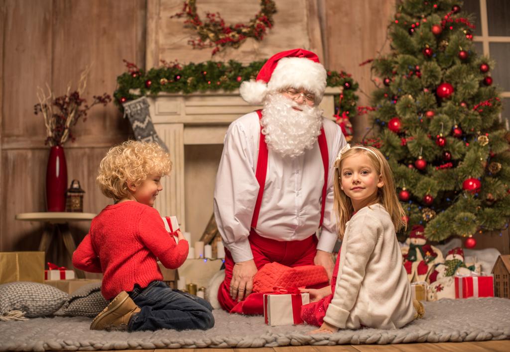 stock-photo-santa-claus-and-children-with.jpeg